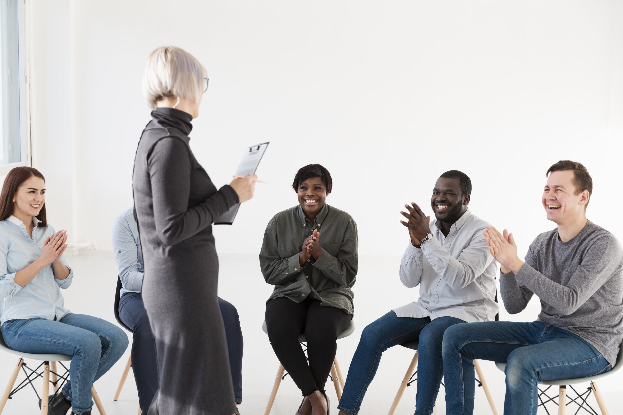 happy-rehab-patients-applauding-doctor-scaled.jpg